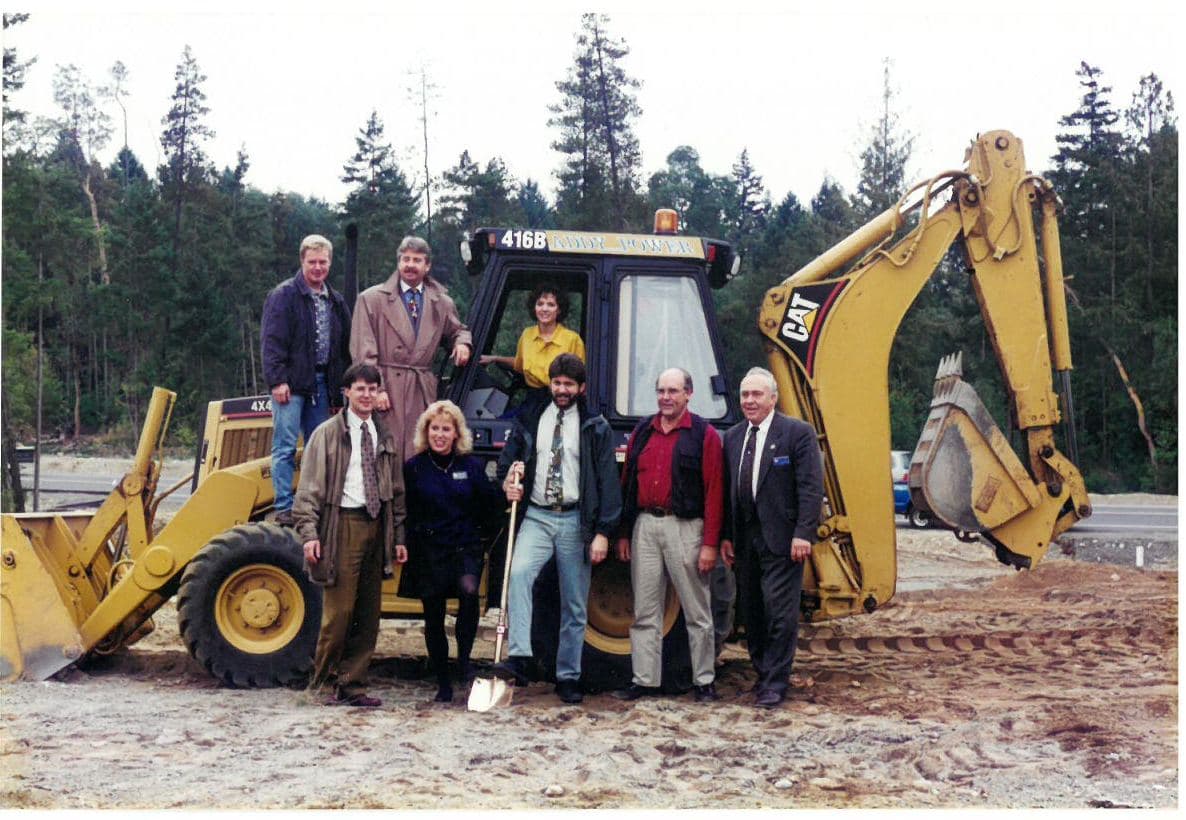 Building committee and board members breaking ground for the new office in 1995